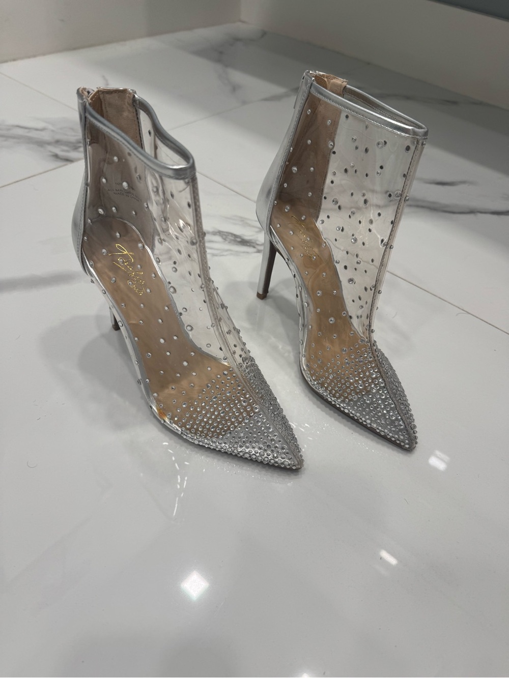Thalia Sodi Clear PVC Pointed-Toe Rhinestone Ankle Boots in Silver